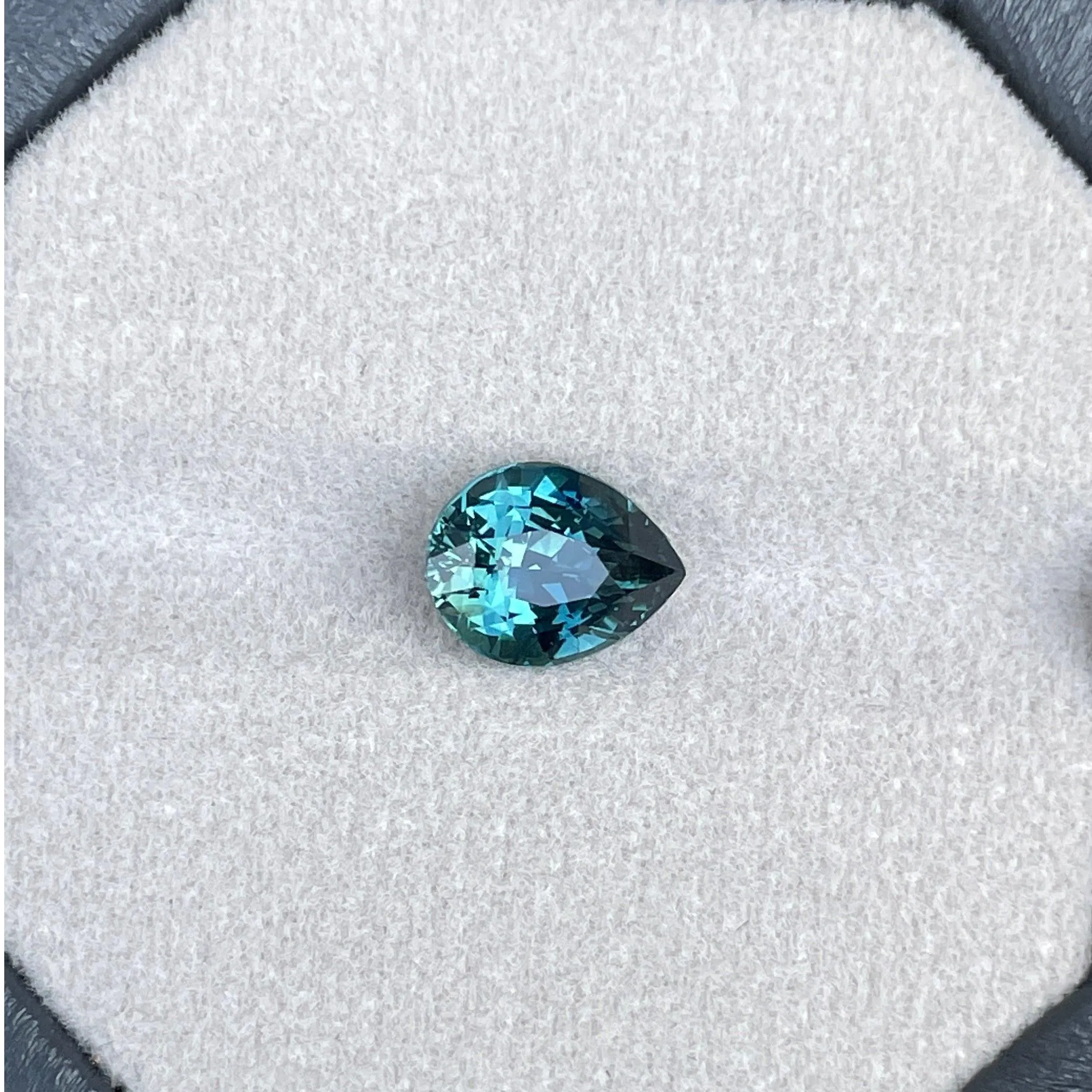 3.18 Carat Teal Sapphire Pear shape. Clean stone.